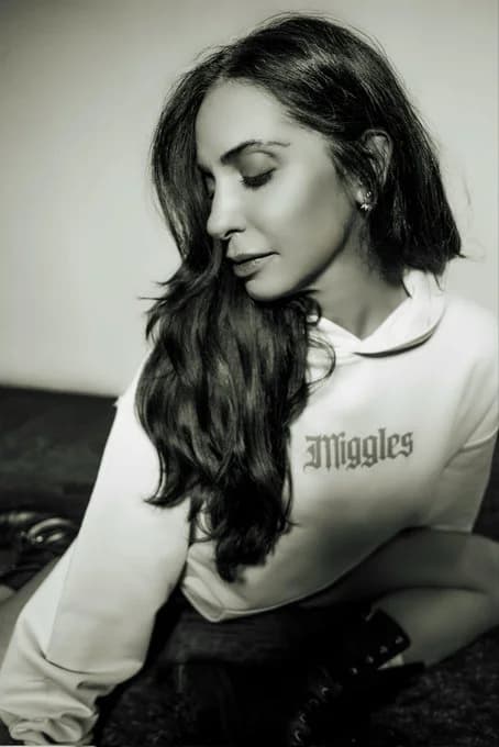 Miggles white hoodie portrait